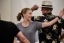 A younger person and an older person dance.
