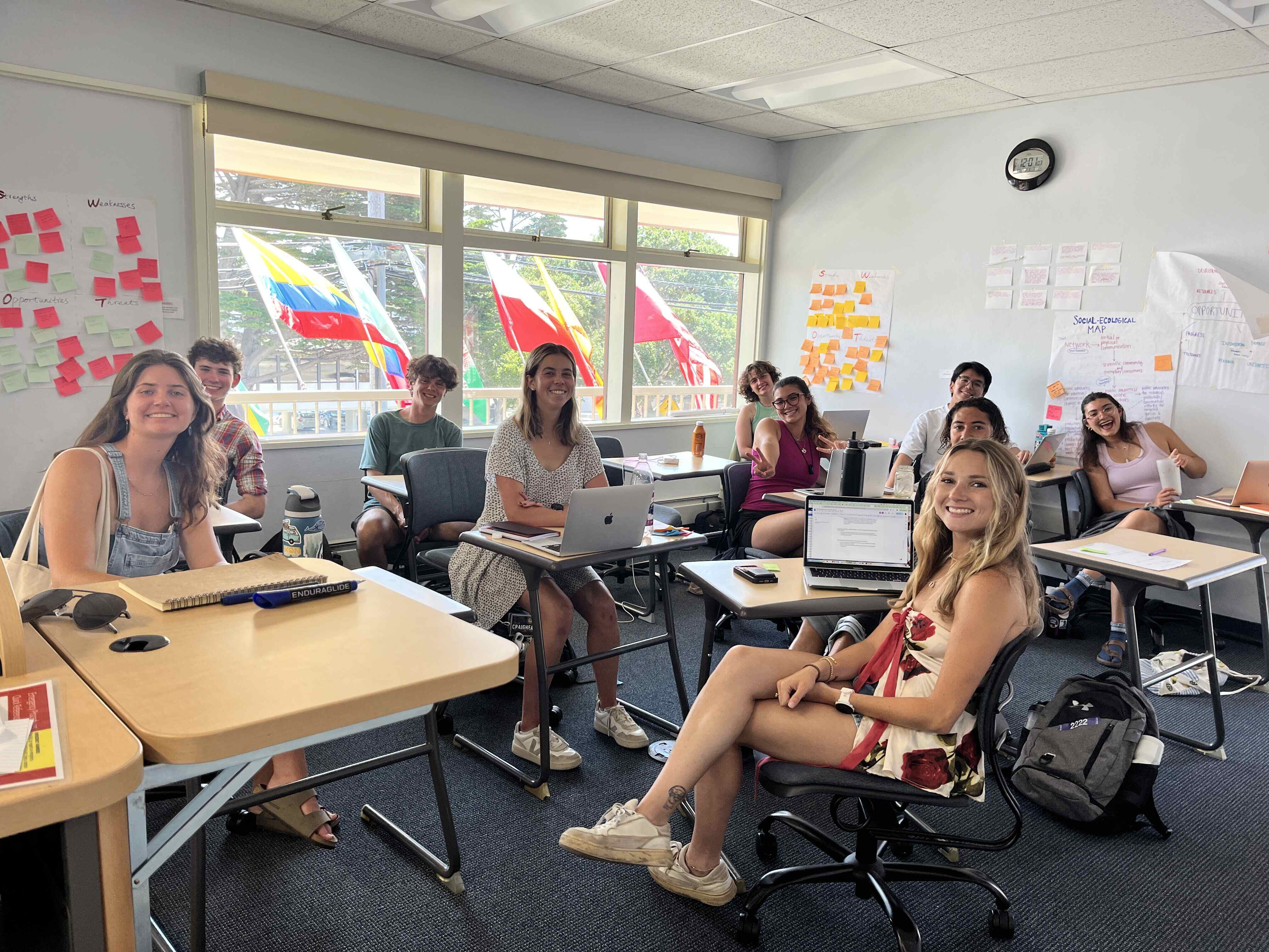 Students smiling in a classroom