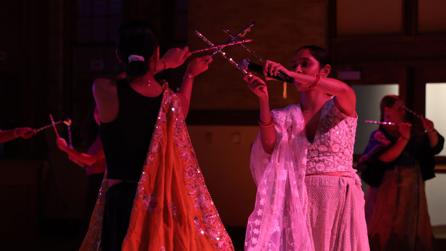Garba dancing with sticks