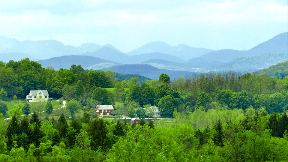 Ariel photo of Middlebury's Vermont campus in Spring.