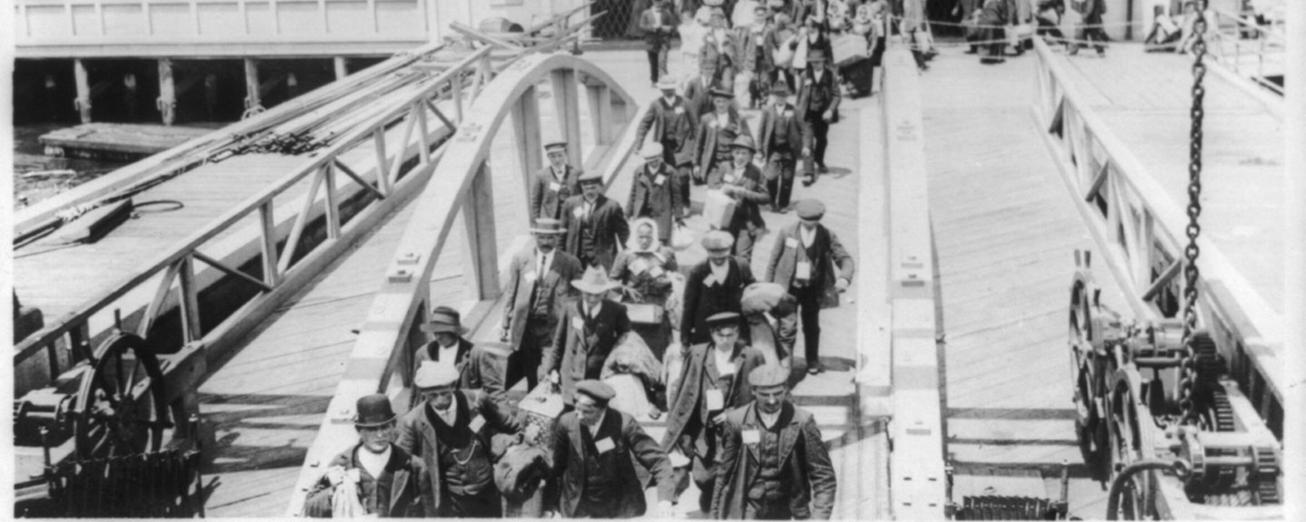 Immigrants disembarking at Ellis Island