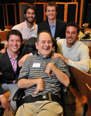 (clockwise from left in photo) Kevin Glatt ’11 of Knoxville, Tenn., Zachary Fenster ’12 of New York, N.Y., Dylan Fitzpatrick ’11 of Ithaca, N.Y., and Benjamin Silton ’11 of Sudbury, Mass., with Richard “Butch” Varno (center)