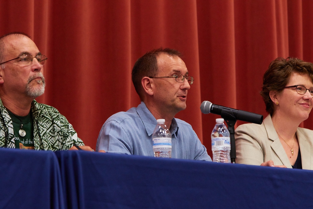 Jason Merrill delivered remarks while flanked by Steve Trombulak and Susan Baldridge.