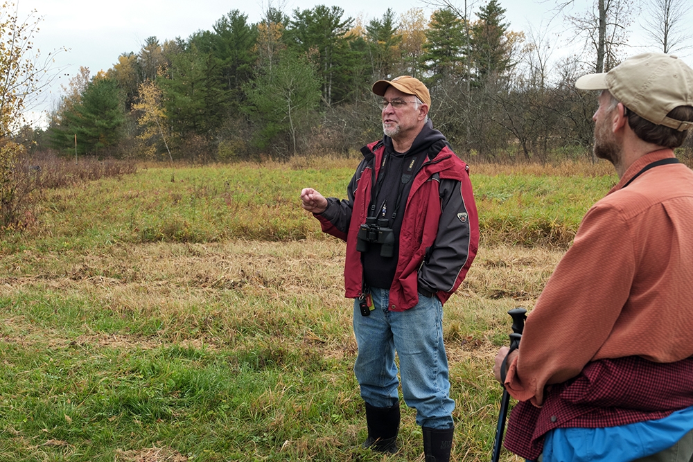 Professor Emeritus Steve Trombulak wearing field gear on a fall day at the Trombulak Nature Sanctuary.