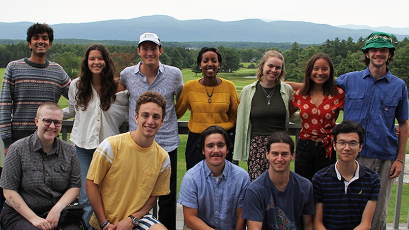 Sustainability students interns in front of mountains