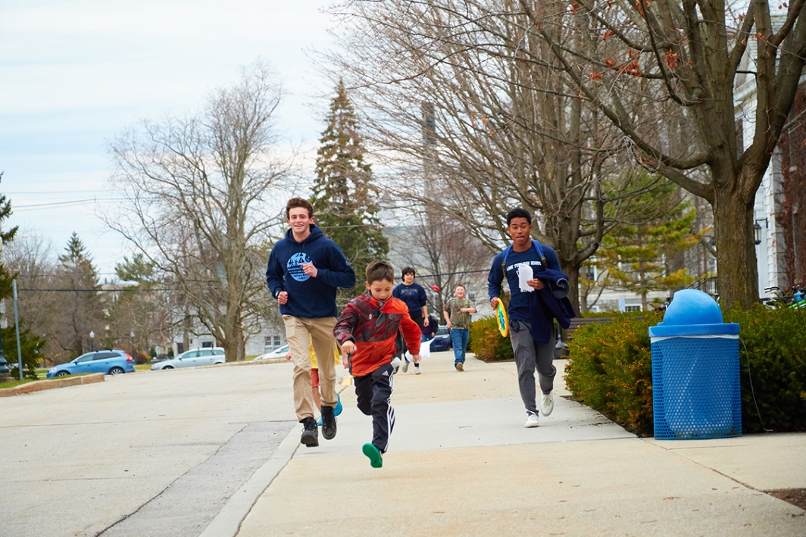 wildmidd_students_kids_run_sidewalk.jpg