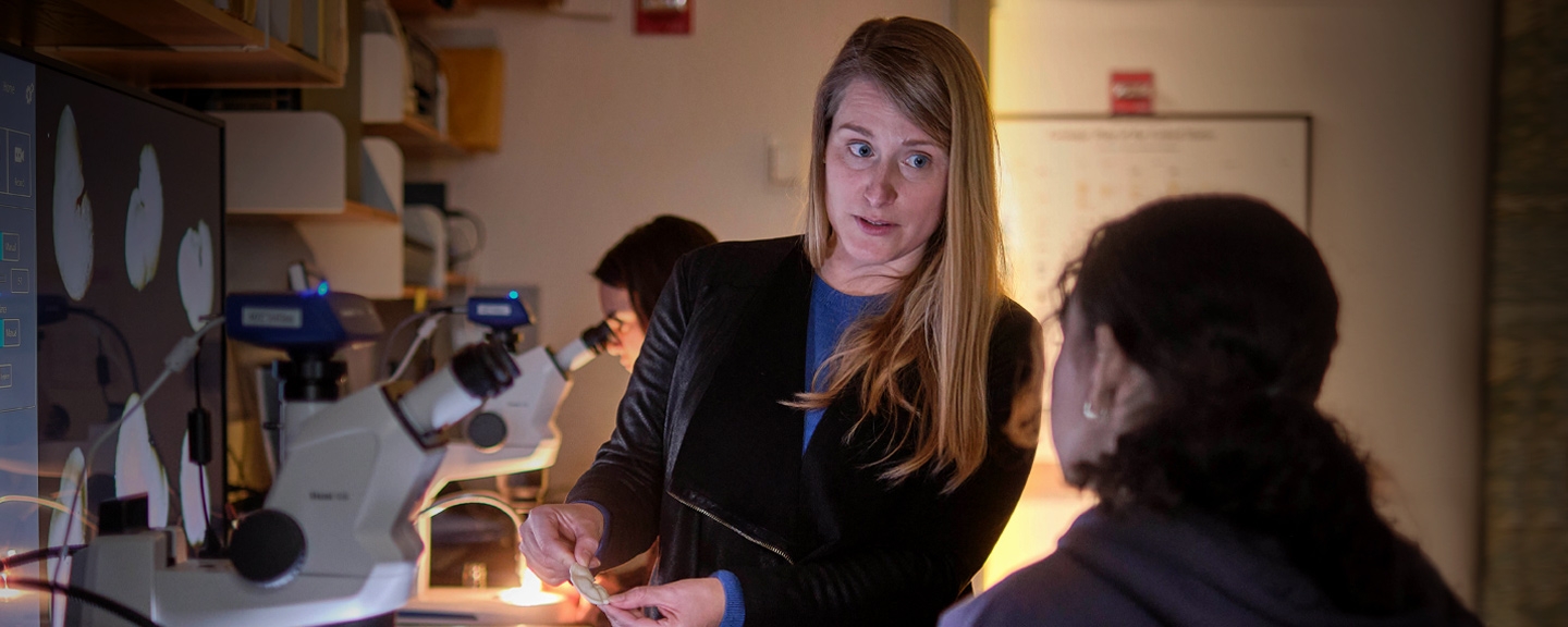 Two students working in a science lab