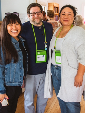 Three reunion volunteers posing for a picture during reunion