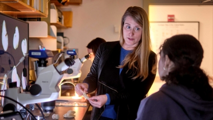 Two students working in a science lab