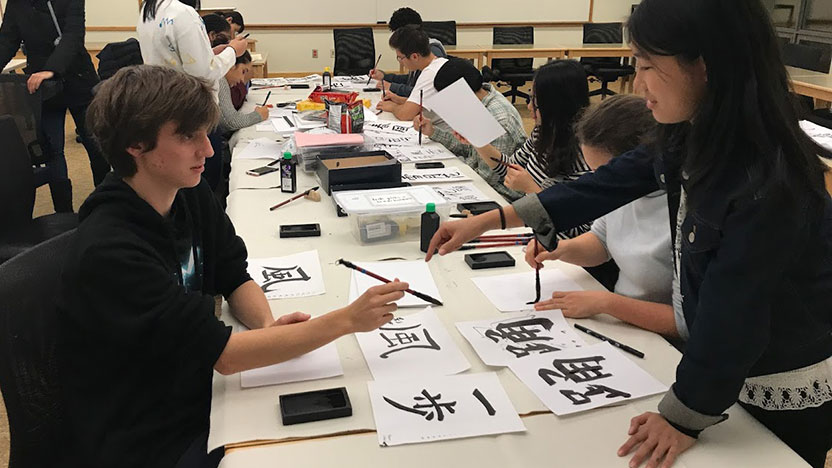 Students learn Japanese calligraphy
