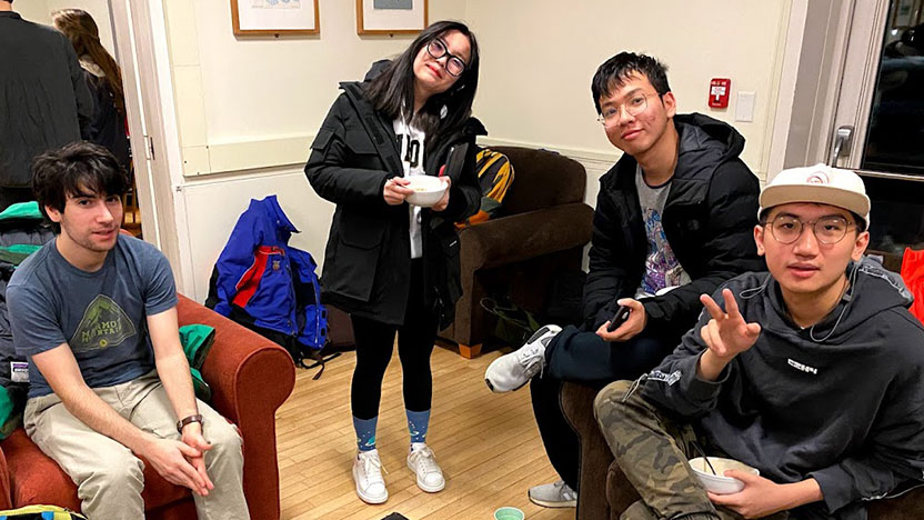 Four students hang out together in the Japanese House