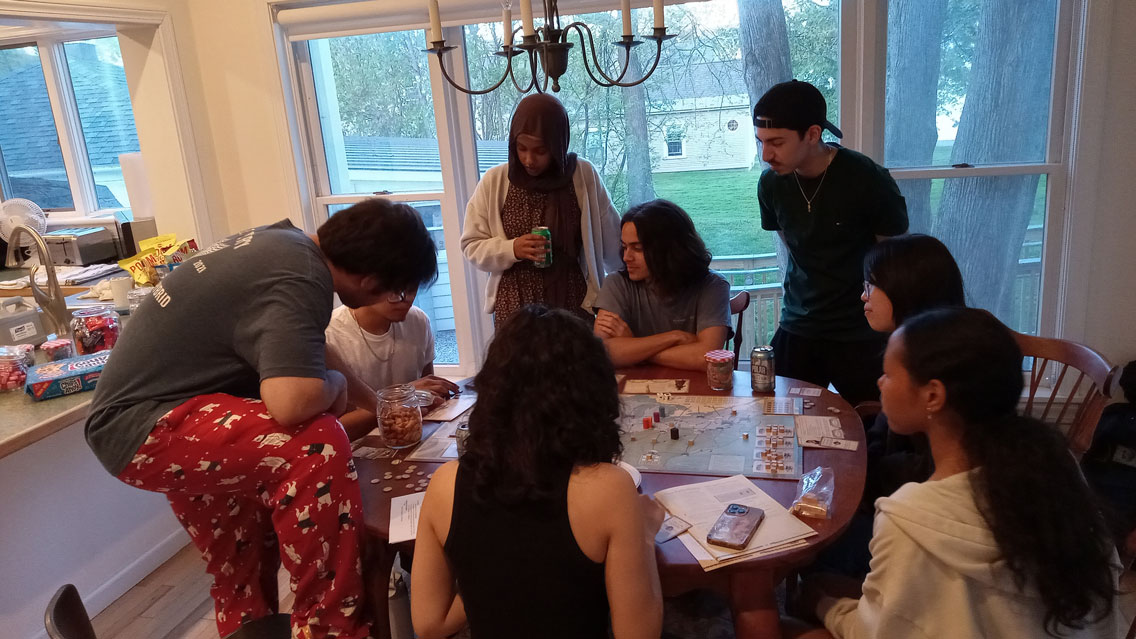 Students enjoying playing board games at the BLST Game Night.