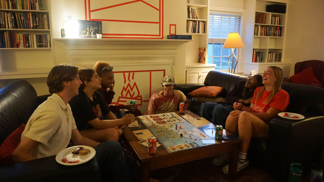 Students enjoying playing board games at the BLST Game Night.