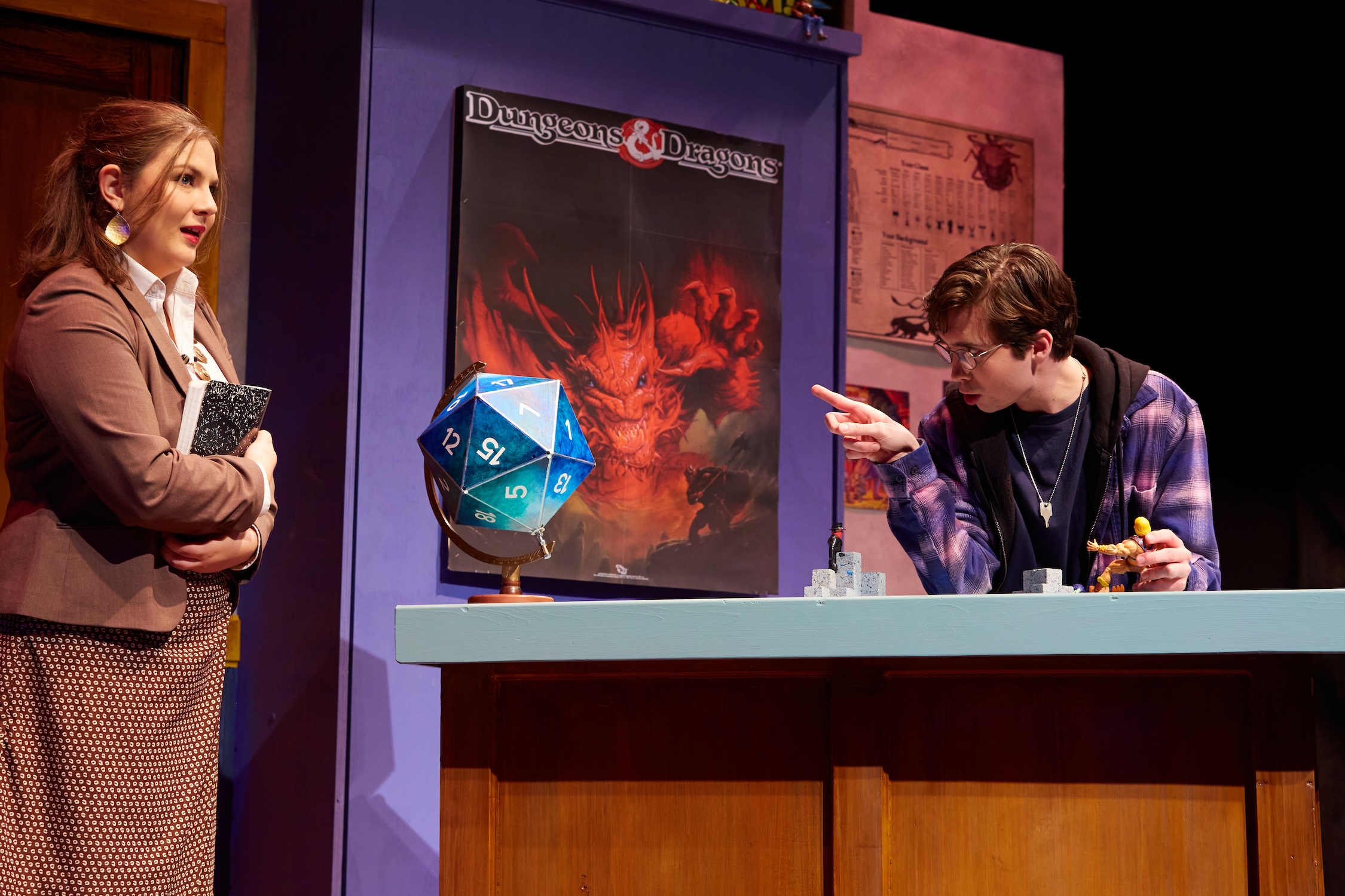 Woman in a game store talking to an employee