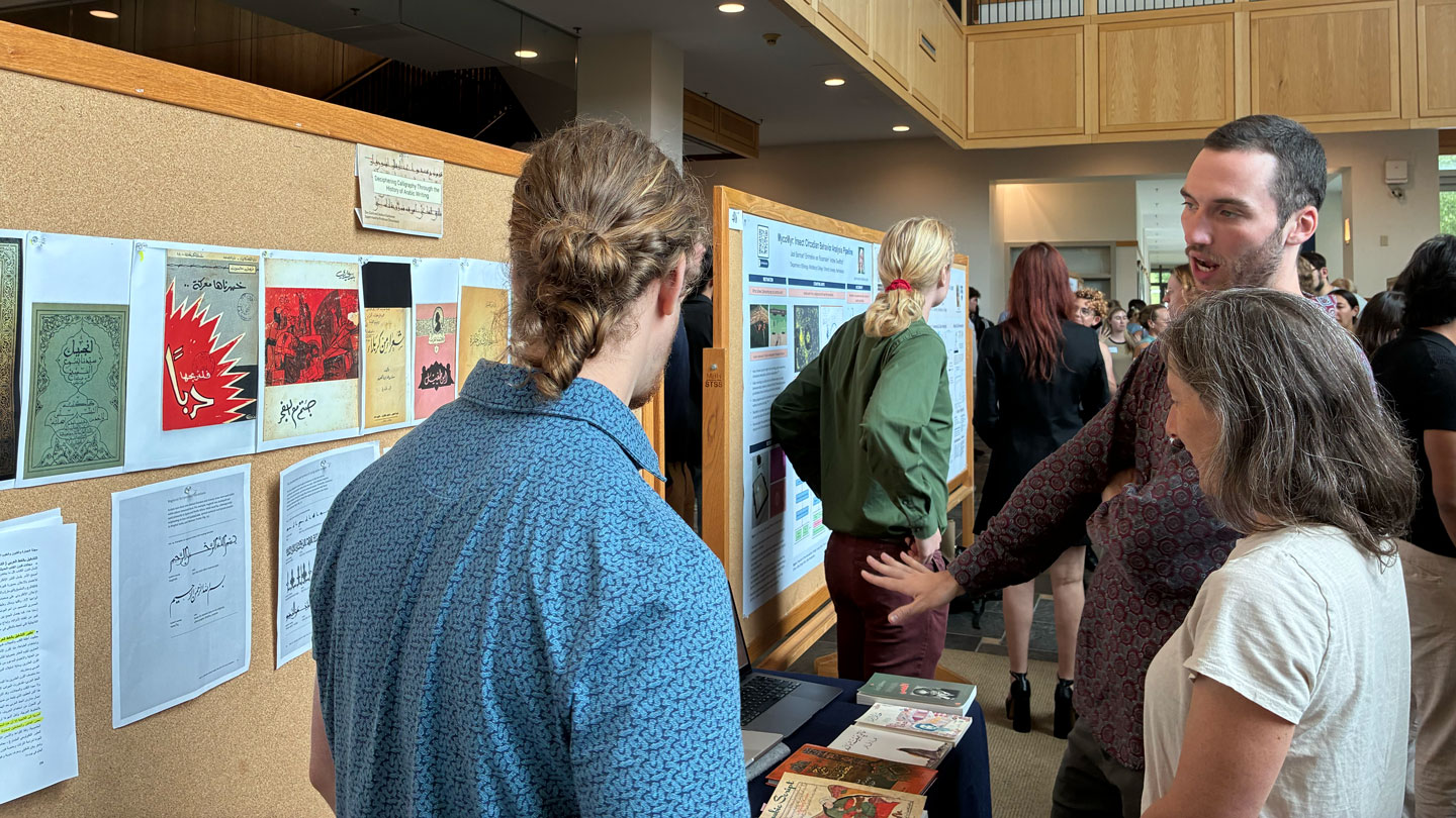 Summer research assistants, Joshua Glucksman ‘24.5 and Zev Gold ’27 presented at the Summer Research Symposium on the relationship between Arabic calligraphy and genre in modern Arabic printing as a part of their summer research supervised by Professor Dima Ayoub. The presentation included the history of Arabic writing, its religious significance, and the characteristics of prominent calligraphic styles.
