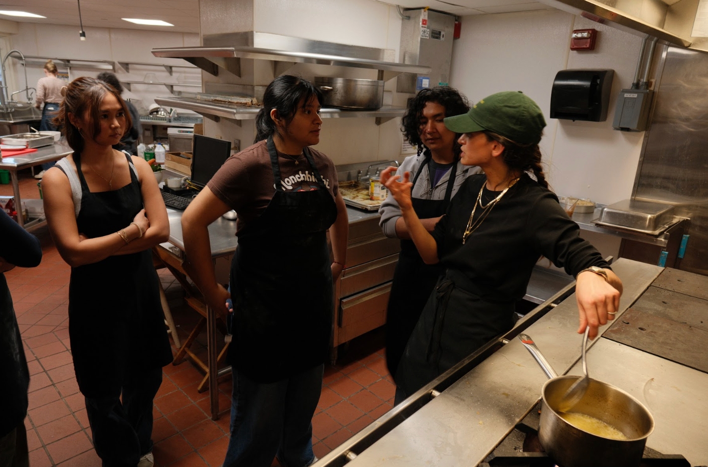 Students learn from Chef Dima during the first cooking class.