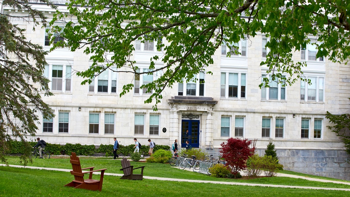 The entrance to Warner Hall on a fall day.