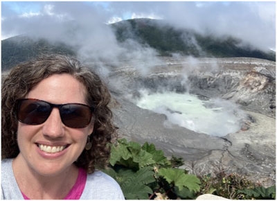 Gina Thomas with a view of Costa Rica in the background.