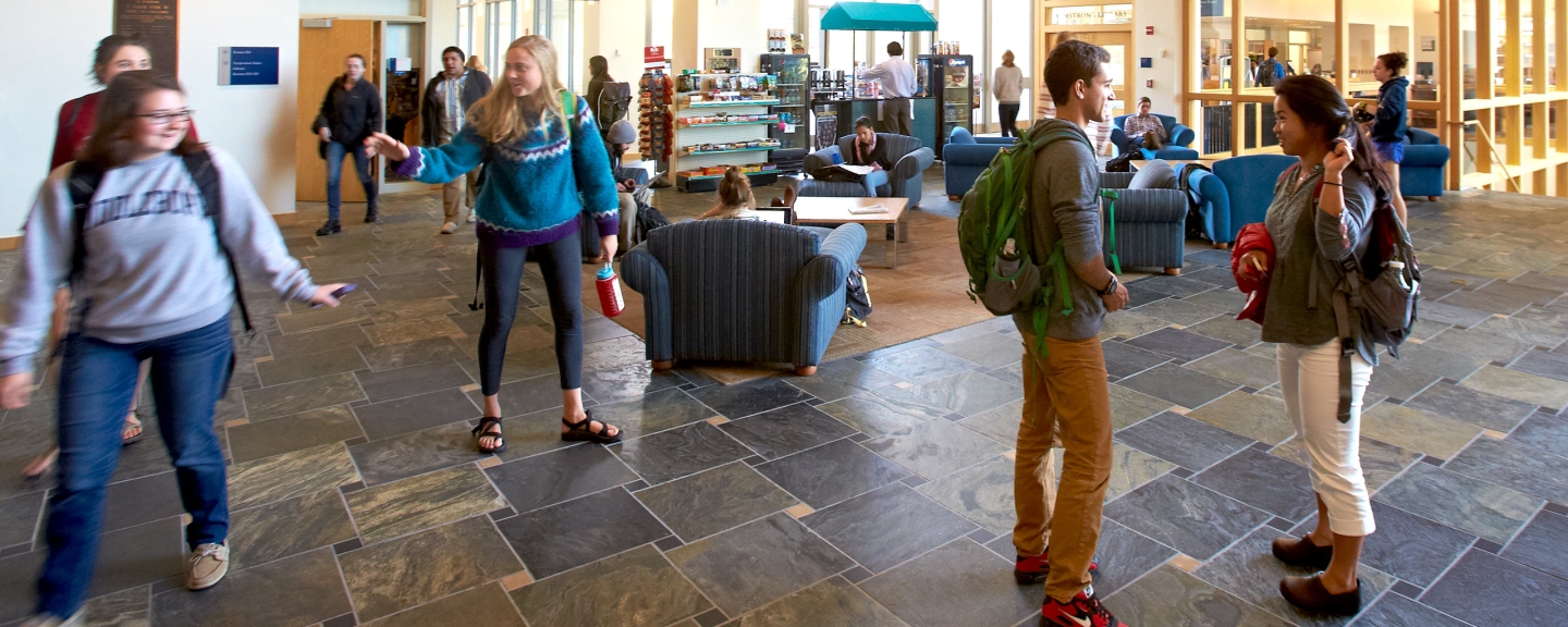 Students take a break from classes in Middlebury's McCardell Bicentennial Hall.