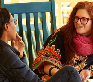 Two Bread Loaf School of English students converse.