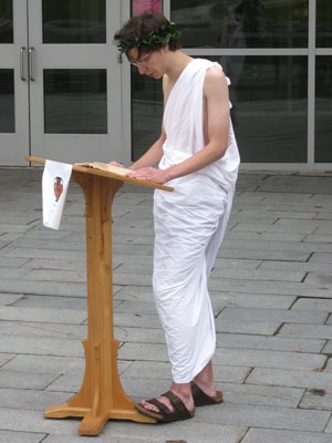 Student during the Classics department marathon reading each spring.