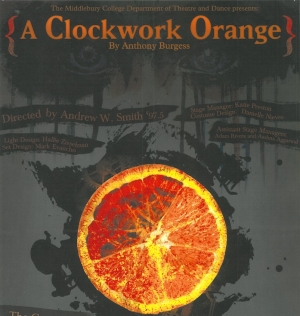 A crystalline orange amidst a page with black splotches