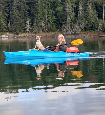 Mirjam and dog in kayak