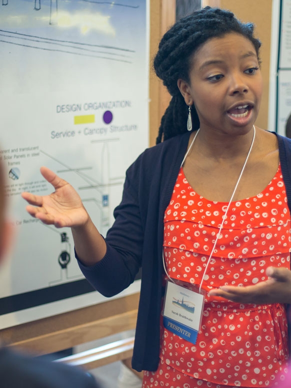 A student presents her research at the Spring Sympoisum.