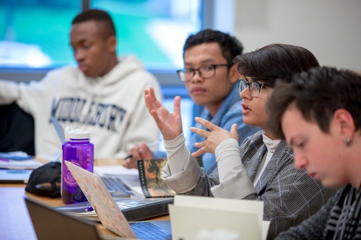 Students having a discussion in class