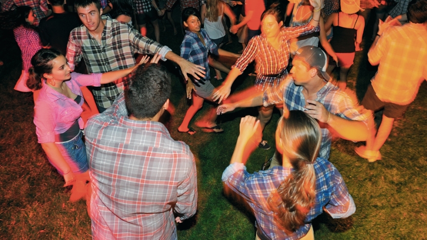 Students participate in a square dance.