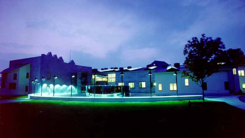 A rear view of the Arts plaza at night.