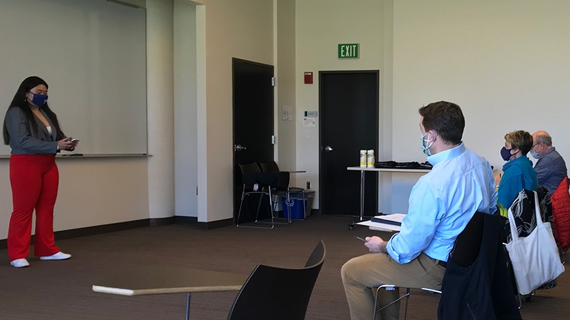 TEDx students sit in classroom and test their speeches.