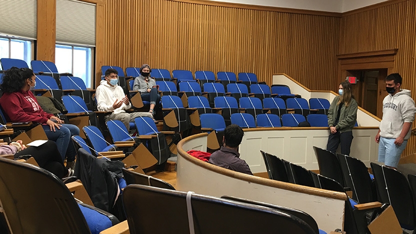 Several students sit in classroom for Oratory in Action.