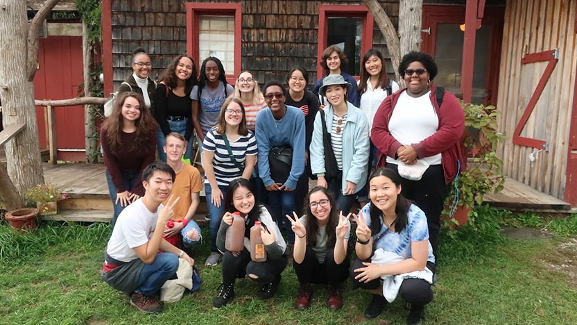 Students pose for a photo outside the Japanese House