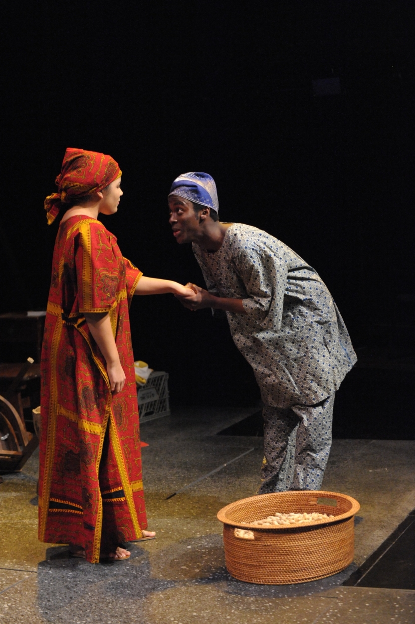 An actor about to kiss an actresses hand