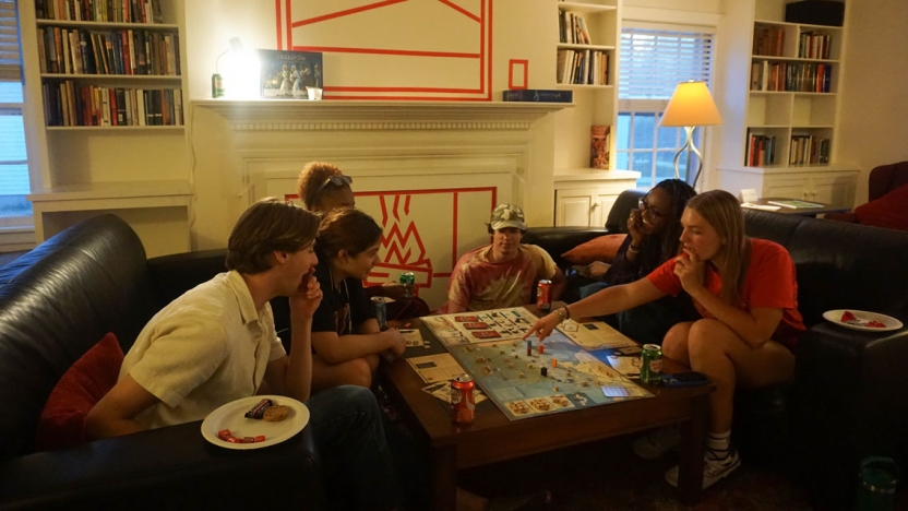 Students enjoying playing board games at the BLST Game Night.