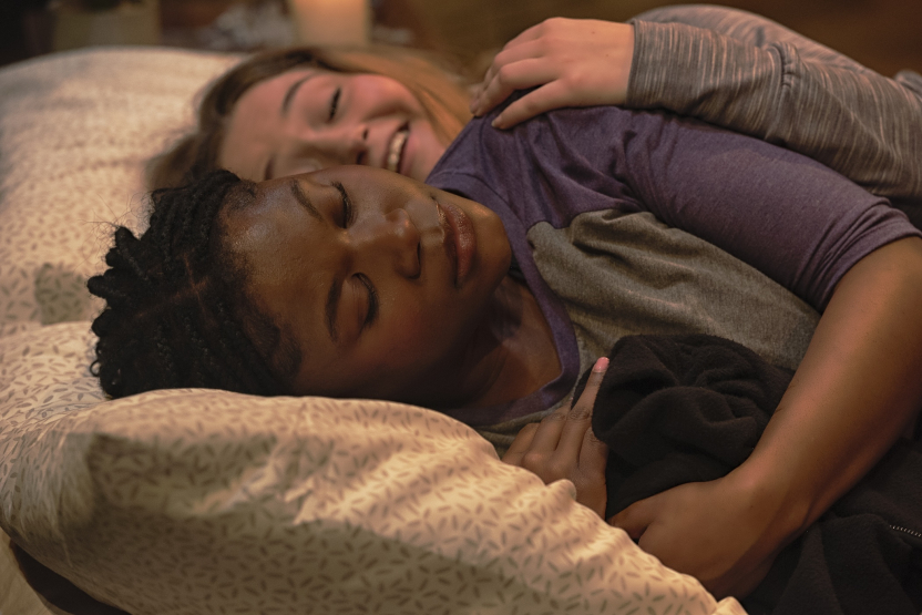 two women in bed