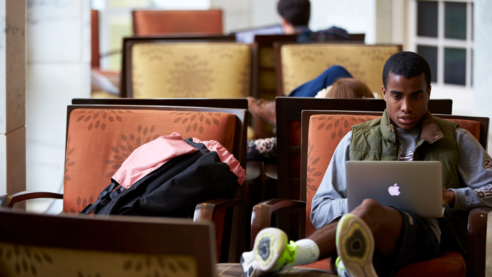 A student works in a quiet space in Davis Family Library.