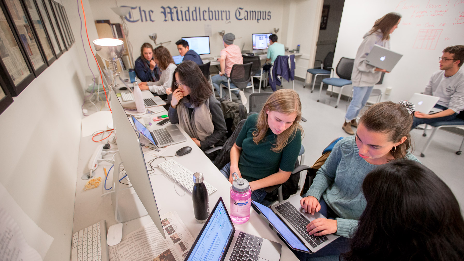 The staff of the student-run Middlebury Campus work to meet a newspaper deadline.