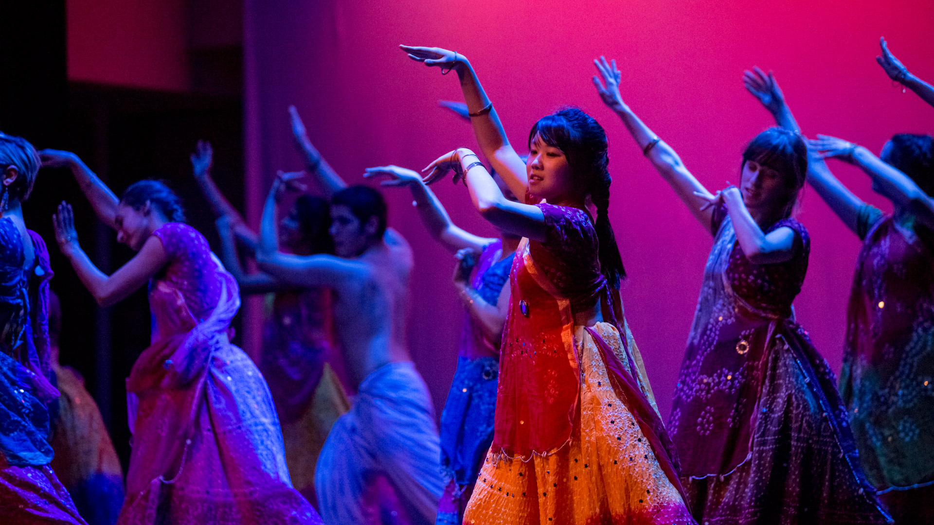 Members of the International Student Organization stage a dance performance.