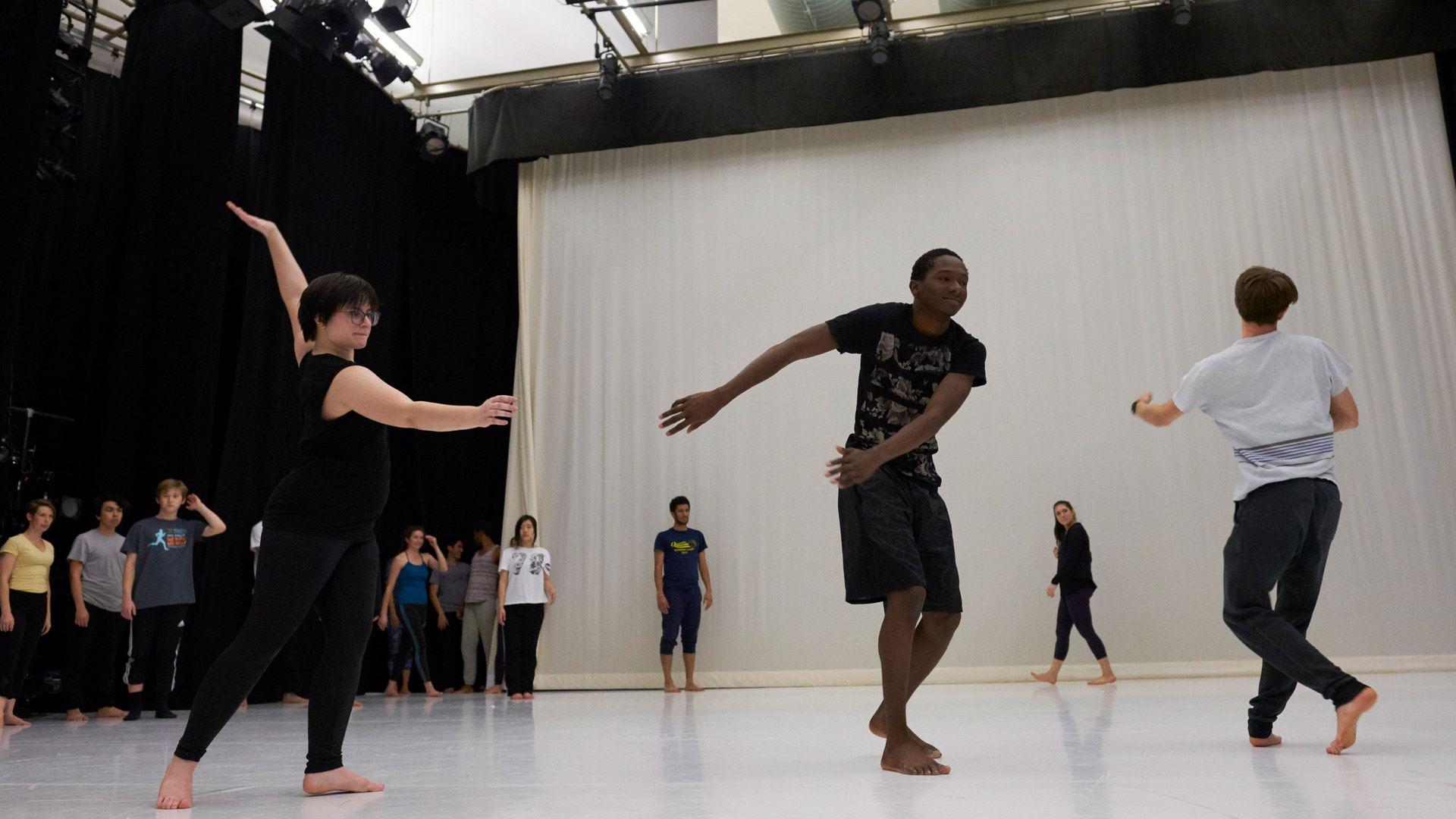 Students participate in a dance class with an artist in residence during J-term.
