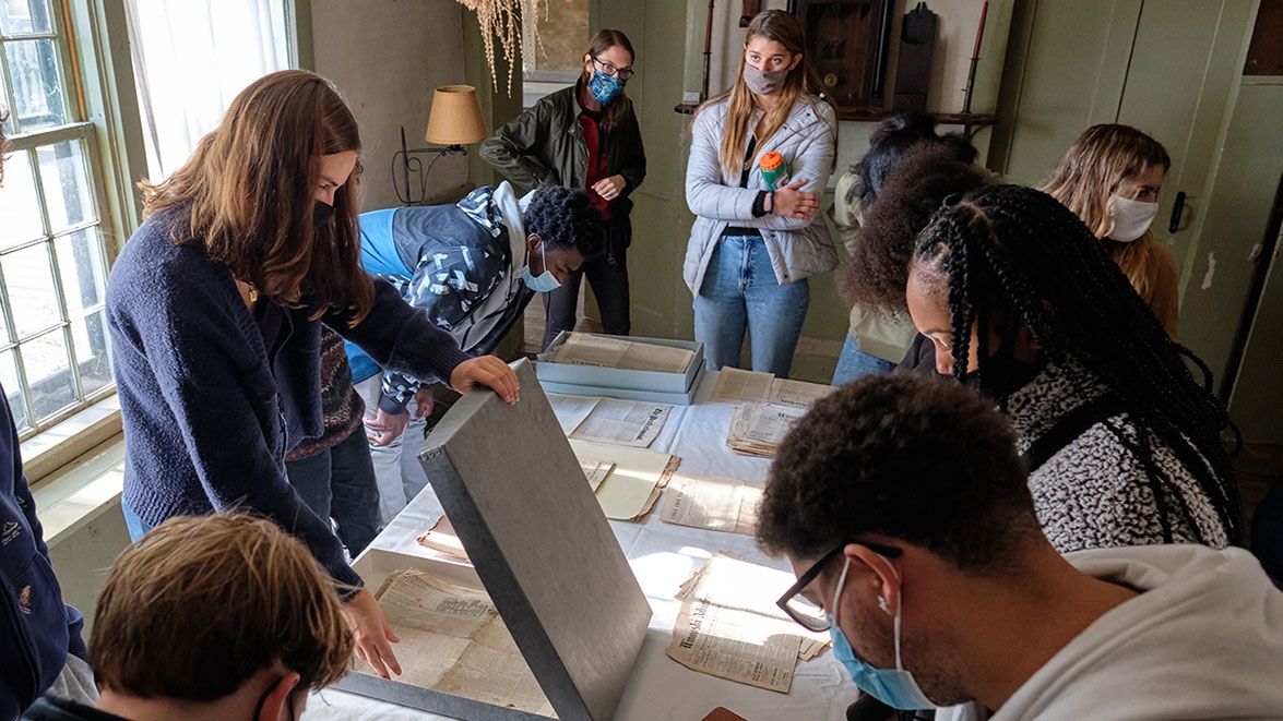 Students in Professor Will Nash’s public humanities lab course “Reading, Slavery, and Abolition” review historical documents at the Rokeby Museum in Ferrisburgh, Vermont. (Photo © 2021 Brett Simison)