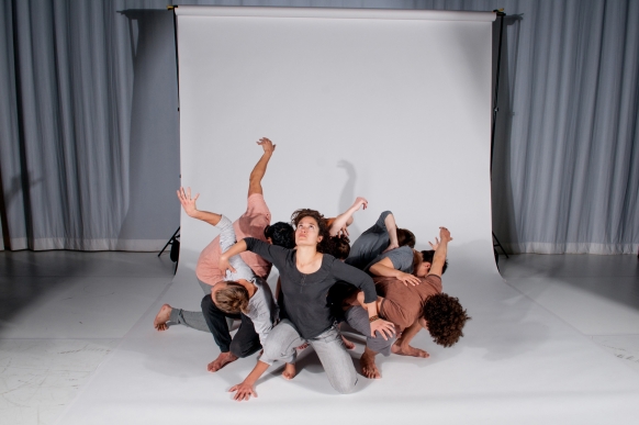 Dancers looking up in a group