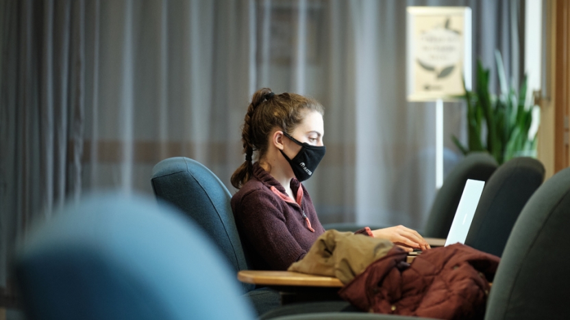 A Middlebury student studies in Davis Family Library.