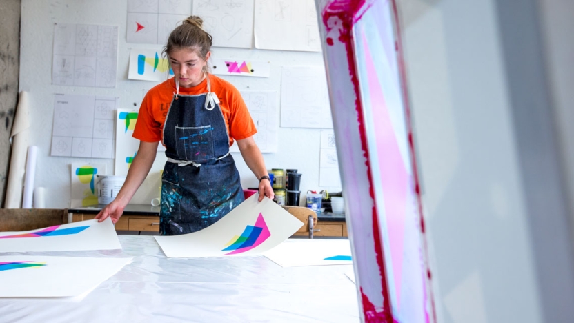 A student at work in the silkscreening studio.