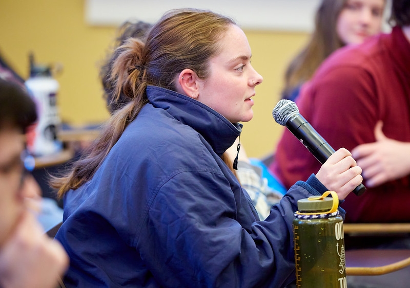 Student asking question at Dr. Jeremy Greene, MD, PhD, guest lecture