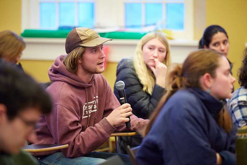 Student asking question at Dr. Jeremy Greene, MD, PhD, guest lecture