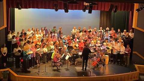 members of the chorus on stage