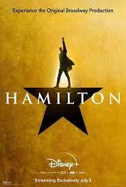 Person with arm in the air standing on a star