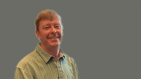 Image of a man wearing a shirt with a collar